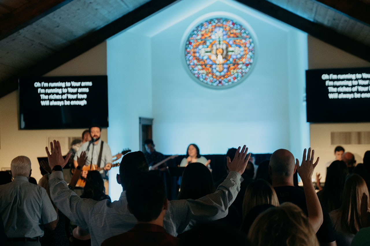 A church congregation participates in worship through music