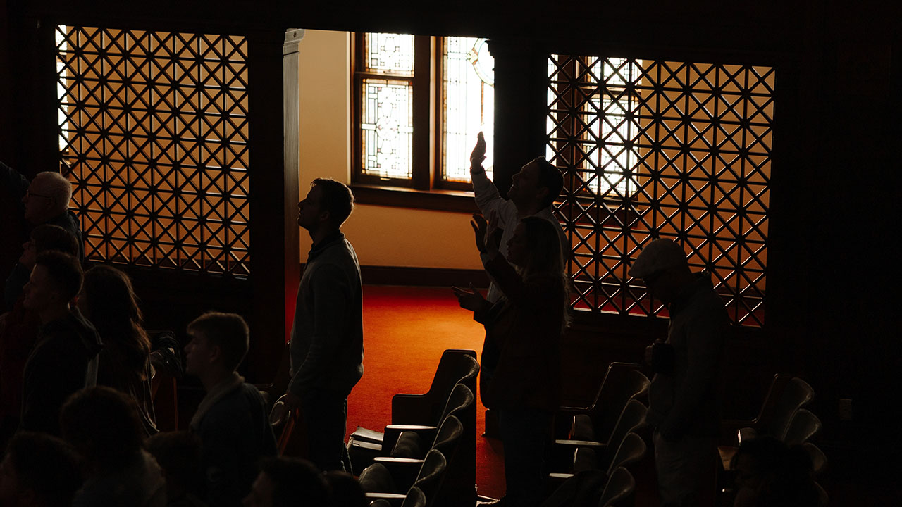 A church congregation participates in worship through music